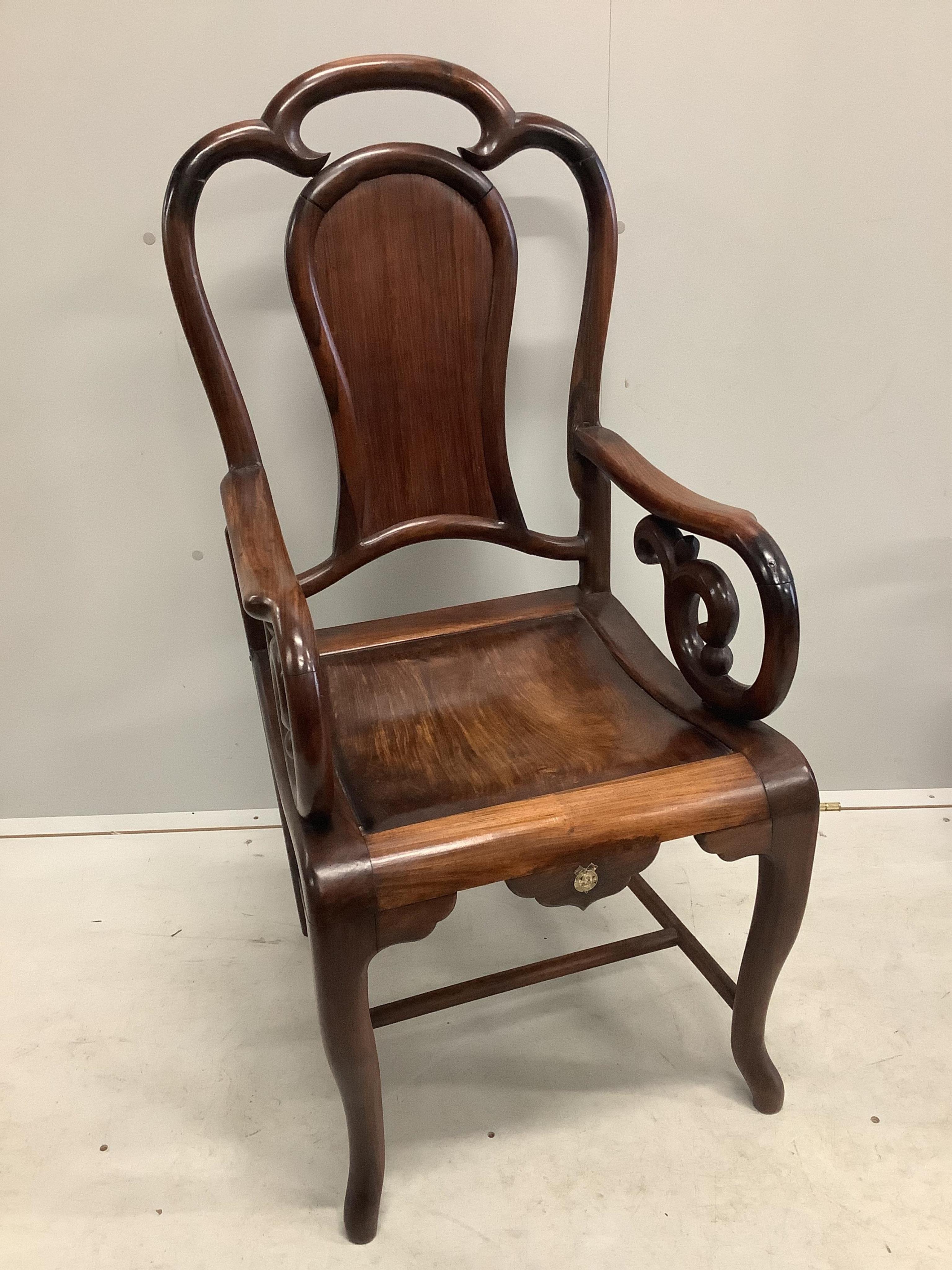 A pair of Chinese hongmu elbow chairs exhibited at British Empire Exhibition Wembley 1924, width 52cm, depth 48cm, height 110cm. Condition - fair to good